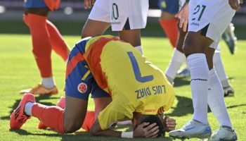 Colombia's forward Luis Diaz grabs his head on the ground during the 2026 FIFA World Cup South American qualifiers football match between Bolivia and Colombia, at the Municipal stadium in El Alto, Bolivia on October 10, 2024. (Photo by AIZAR RALDES / AFP)